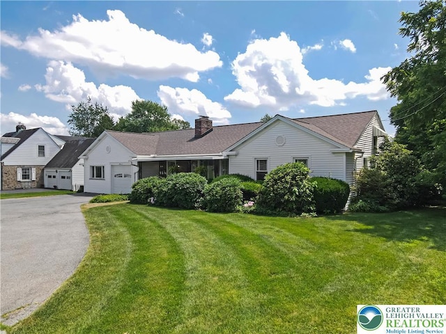 2930 Green Pond, Palmer Twp, PA 18045 - ranch-style house with an attached garage, driveway, a chimney, and a front lawn