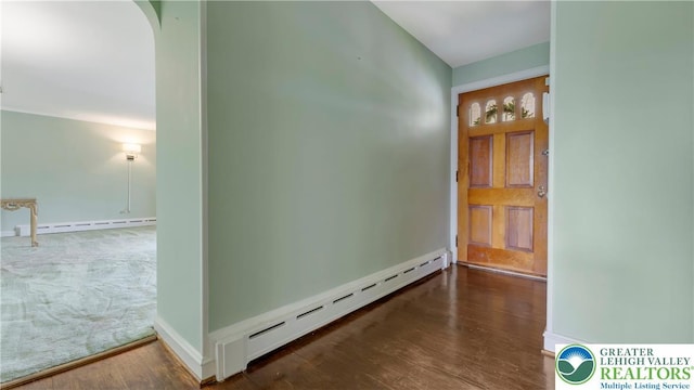 2930 Green Pond, Palmer Twp, PA 18045 - corridor with a baseboard heating unit, wood finished floors, a baseboard radiator, and arched walkways
