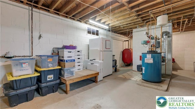 2930 Green Pond, Palmer Twp, PA 18045 - unfinished below grade area featuring water heater, heating fuel, and freestanding refrigerator