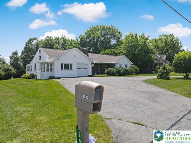 2930 Green Pond, Palmer Twp, PA 18045 - ranch-style home with a garage, asphalt driveway, and a front yard