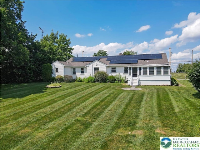 2930 Green Pond, Palmer Twp, PA 18045 - rear view of house featuring roof mounted solar panels and a yard
