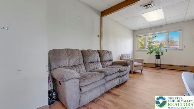 2930 Green Pond, Palmer Twp, PA 18045 - living room with baseboard heating, a drop ceiling, and light wood finished floors