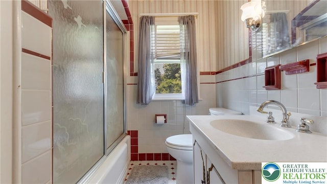 2930 Green Pond, Palmer Twp, PA 18045 - full bath featuring tile walls, vanity, wallpapered walls, and combined bath / shower with glass door