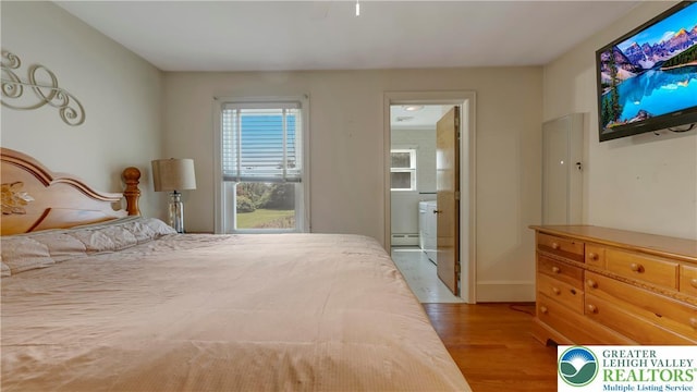 2930 Green Pond, Palmer Twp, PA 18045 - bedroom featuring wood finished floors and a baseboard radiator