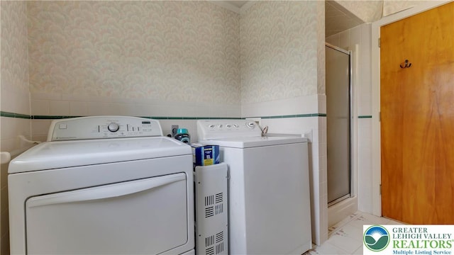 2930 Green Pond, Palmer Twp, PA 18045 - laundry room featuring wallpapered walls, a wainscoted wall, washer and dryer, and tile walls