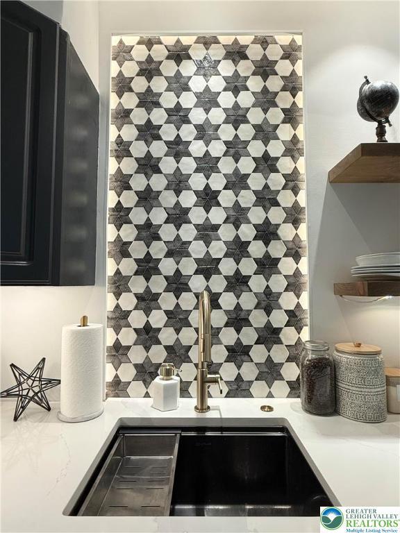 12 Concord Ct, Easton, PA 18040 - detailed view of open shelves, tasteful backsplash, and dark cabinets