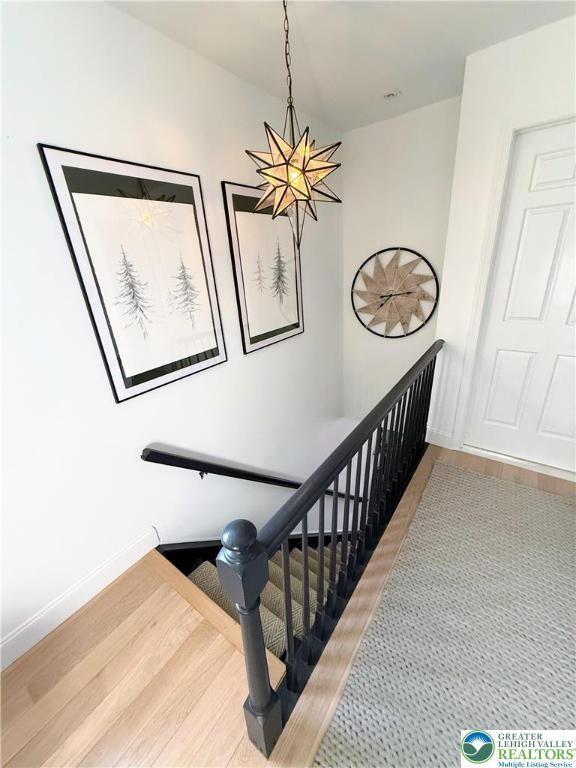 12 Concord Ct, Easton, PA 18040 - stairway featuring wood finished floors and baseboards