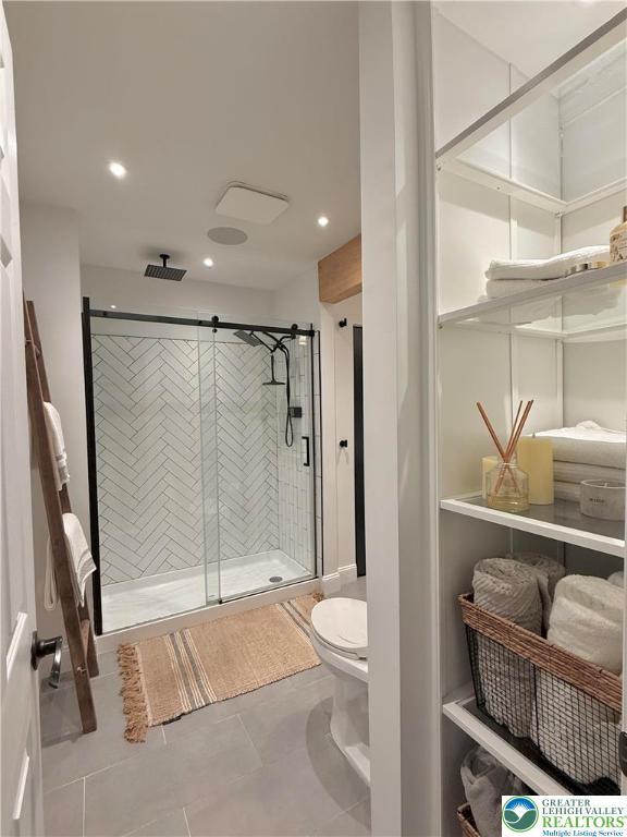 12 Concord Ct, Easton, PA 18040 - bathroom with a stall shower, recessed lighting, and tile patterned floors
