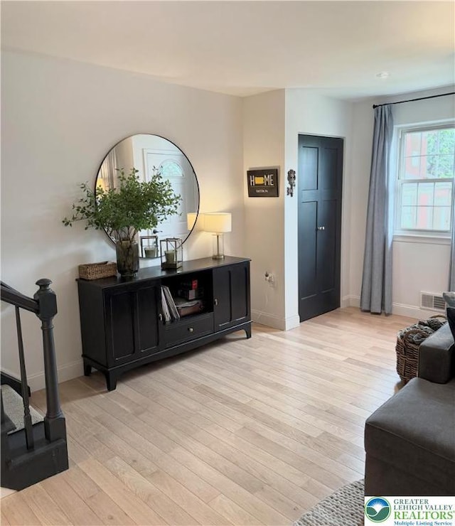 12 Concord Ct, Easton, PA 18040 - living area with light wood-style flooring and stairs