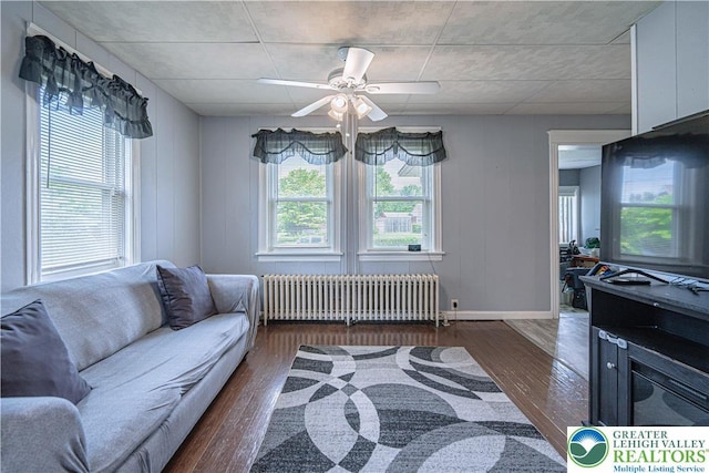 858 Radclyffe St, Bethlehem City, PA 18017 - living area with radiator, wood finished floors, and a ceiling fan