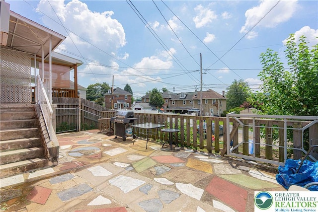 858 Radclyffe St, Bethlehem City, PA 18017 - view of patio / terrace featuring area for grilling, a residential view, and stairway