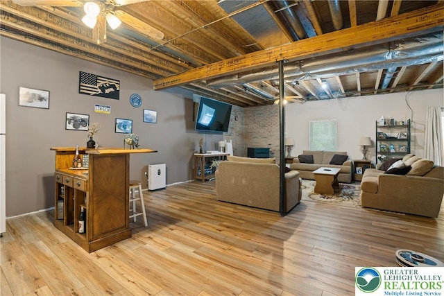 2954 Avery Rd, Washington Twp, PA 18080 - living room with light wood-style floors, a ceiling fan, and a fireplace