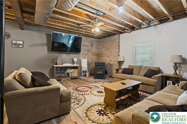 2954 Avery Rd, Washington Twp, PA 18080 - living room with a wood stove, wood finished floors, and ceiling fan