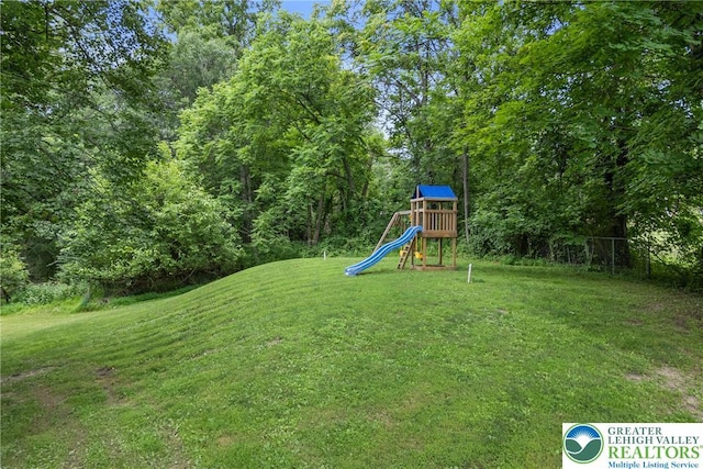 2954 Avery Rd, Washington Twp, PA 18080 - view of grassy yard with a playground