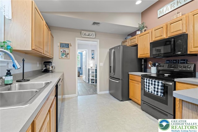2954 Avery Rd, Washington Twp, PA 18080 - kitchen featuring black microwave, electric range oven, stainless steel refrigerator with ice dispenser, light brown cabinets, and light countertops