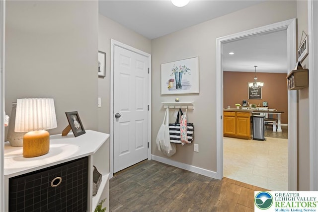 2954 Avery Rd, Washington Twp, PA 18080 - entrance foyer with a chandelier and wood finished floors