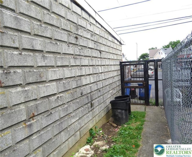 151 W Nesquehoning St, Easton, PA 18042 - view of property exterior with a gate
