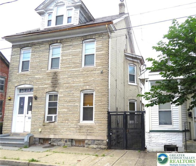 151 W Nesquehoning St, Easton, PA 18042 - view of front of property featuring stone siding and a gate