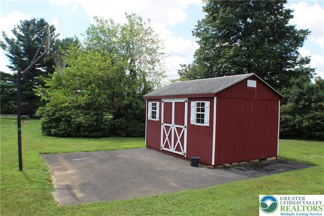 1321 Bushkill Center Rd, Bushkill Twp, PA 18091 - view of shed with view of wooded area