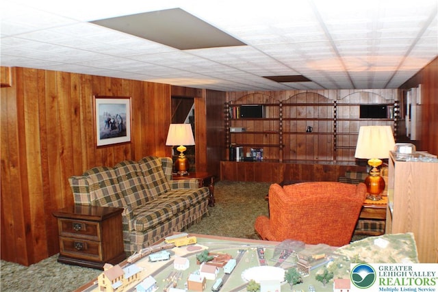 1321 Bushkill Center Rd, Bushkill Twp, PA 18091 - carpeted living room with wood walls