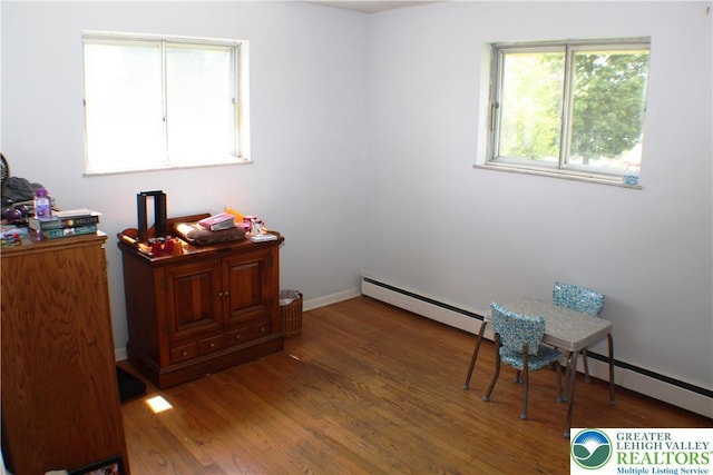 1321 Bushkill Center Rd, Bushkill Twp, PA 18091 - sitting room featuring baseboard heating and wood finished floors