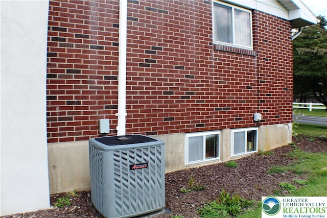 1321 Bushkill Center Rd, Bushkill Twp, PA 18091 - exterior view of a cooling unit and brick siding