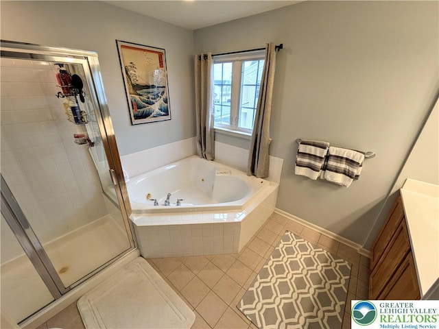 119 Gray Dr, Allen Twp, PA 18067 - bathroom with a whirlpool tub, tile patterned flooring, a stall shower, and vanity