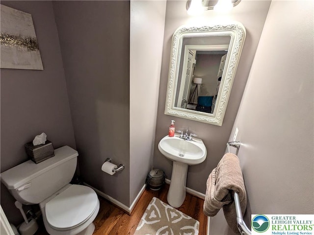 119 Gray Dr, Allen Twp, PA 18067 - half bath with wood finished floors and toilet