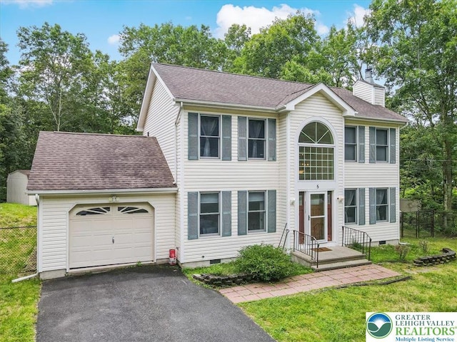 5 Flagstone Ln, East Stroudsburg, PA 18302 - colonial home with an attached garage, crawl space, asphalt driveway, and a chimney