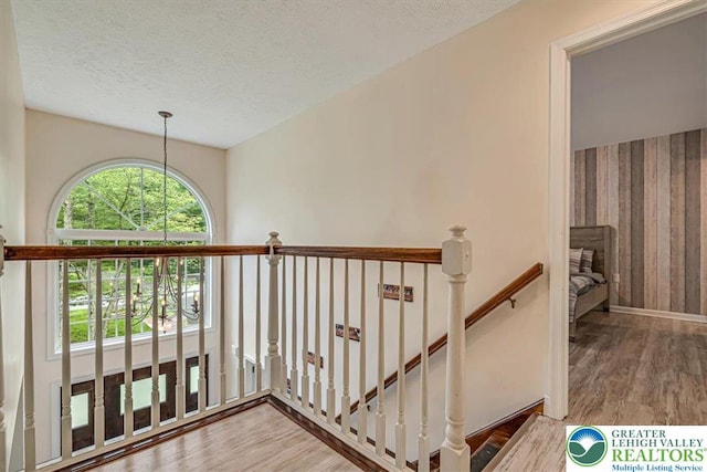 5 Flagstone Ln, East Stroudsburg, PA 18302 - stairs with wood finished floors and a textured ceiling
