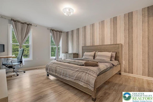 5 Flagstone Ln, East Stroudsburg, PA 18302 - bedroom featuring wallpapered walls and wood finished floors