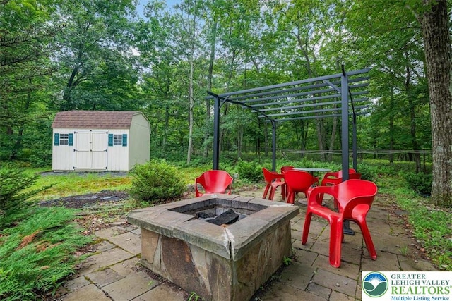 5 Flagstone Ln, East Stroudsburg, PA 18302 - view of patio featuring a fire pit, a storage unit, and a pergola