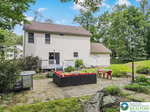5 Flagstone Ln, East Stroudsburg, PA 18302 - back of house with an outdoor hangout area, a patio, and a deck