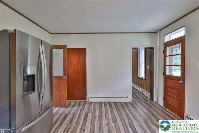 1911 Echo Rd, North Whitehall Twp, PA 18080 - foyer featuring crown molding, a baseboard heating unit, a baseboard radiator, and wood finished floors