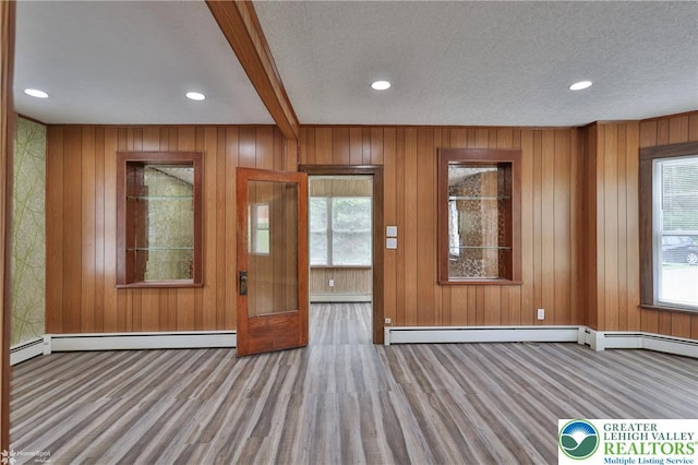 1911 Echo Rd, North Whitehall Twp, PA 18080 - entryway featuring baseboard heating, wood finished floors, recessed lighting, and wood walls