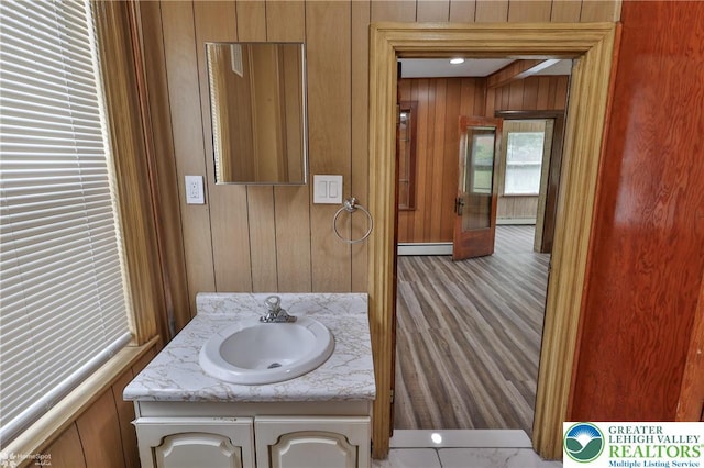 1911 Echo Rd, North Whitehall Twp, PA 18080 - bathroom with vanity, wood walls, a baseboard radiator, and a baseboard heating unit