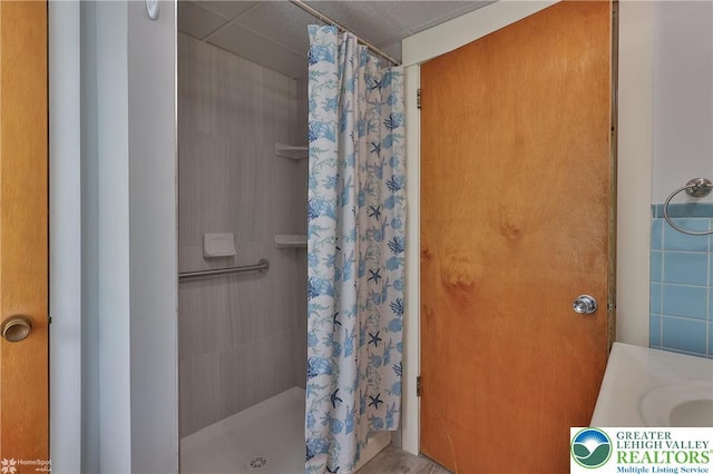 1911 Echo Rd, North Whitehall Twp, PA 18080 - bathroom featuring a drop ceiling, a shower stall, and vanity