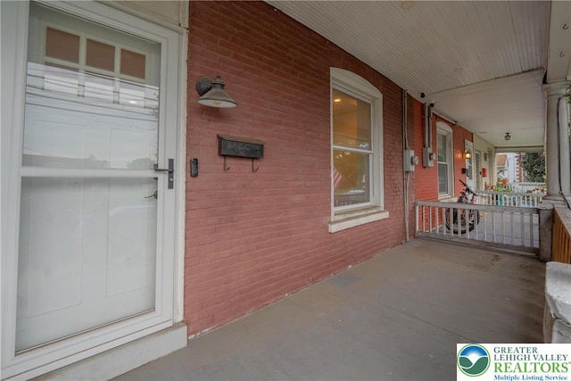 215 Tohickon Ave, Quakertown Boro, PA 18951 - property entrance with a porch and brick siding