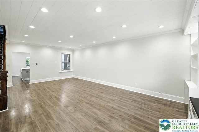215 Tohickon Ave, Quakertown Boro, PA 18951 - unfurnished living room featuring recessed lighting, ornamental molding, and dark wood finished floors