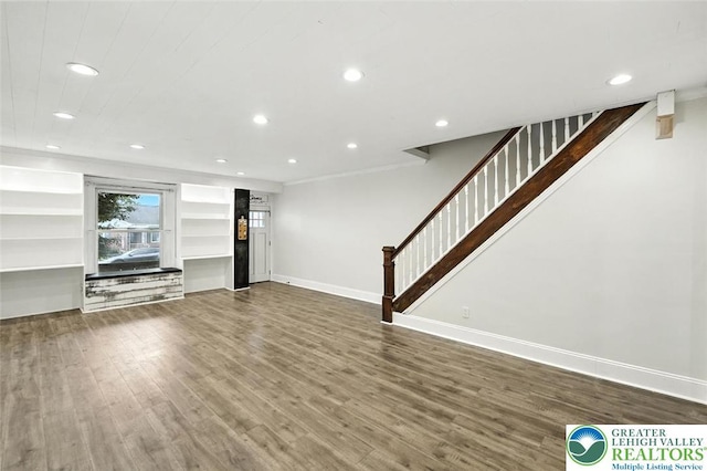 215 Tohickon Ave, Quakertown Boro, PA 18951 - unfurnished living room featuring recessed lighting, wood finished floors, and stairway