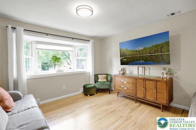 812 Miller St, Salisbury Twp, PA 18103 - sitting room with wood finished floors and baseboards
