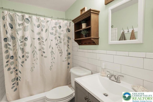 812 Miller St, Salisbury Twp, PA 18103 - full bath with tile walls, vanity, curtained shower, and decorative backsplash