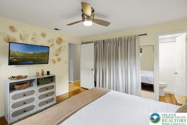 812 Miller St, Salisbury Twp, PA 18103 - bedroom featuring wood finished floors, ensuite bathroom, and a ceiling fan