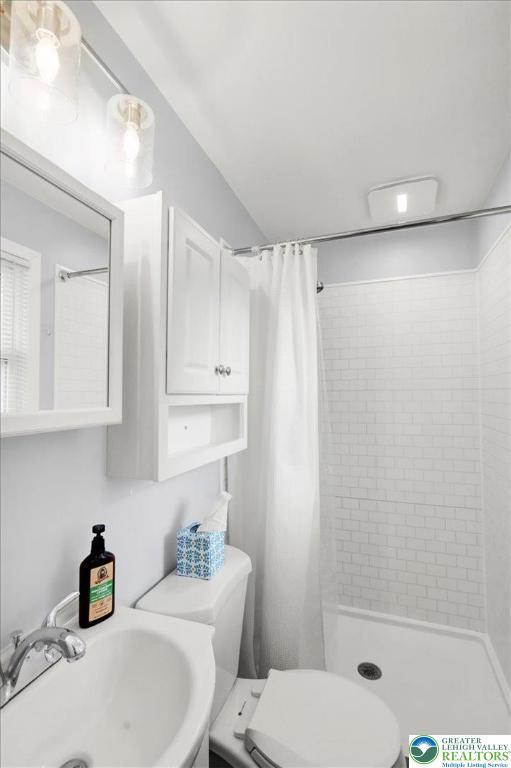 812 Miller St, Salisbury Twp, PA 18103 - full bathroom with a sink and a stall shower