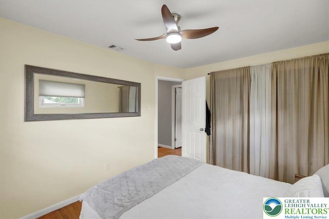 812 Miller St, Salisbury Twp, PA 18103 - bedroom featuring wood finished floors and a ceiling fan