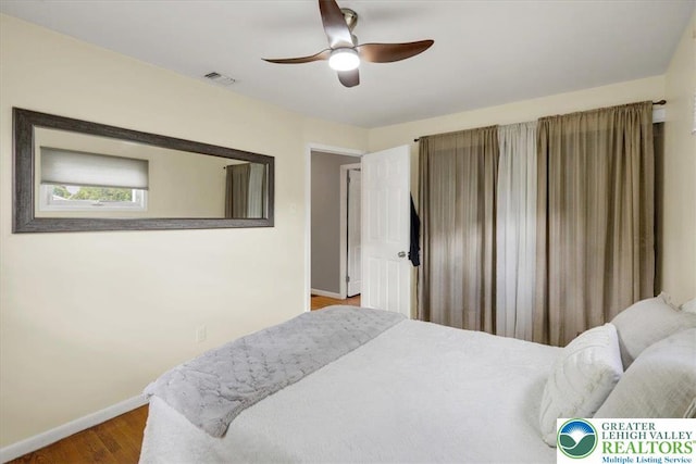 812 Miller St, Salisbury Twp, PA 18103 - bedroom with wood finished floors and ceiling fan