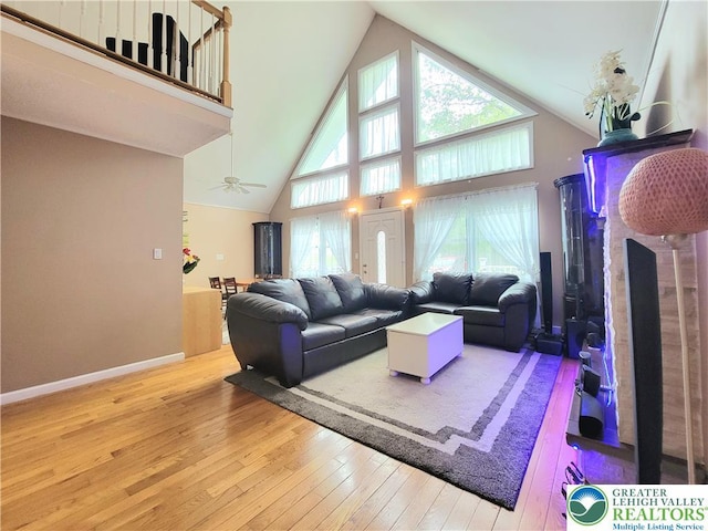 1025 Cricket Ln, Tobyhanna Twp, PA 18334 - living area with hardwood / wood-style flooring, high vaulted ceiling, and a ceiling fan