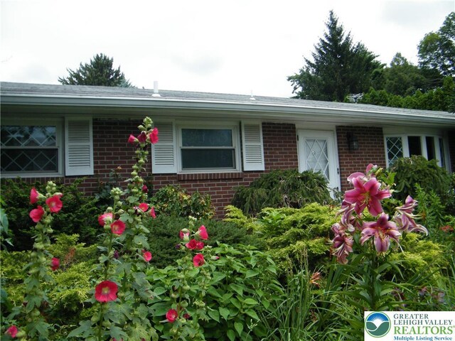 3415 Kathleen Ave, Salisbury Twp, PA 18103 - view of exterior entry featuring brick siding