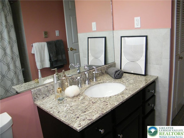 3415 Kathleen Ave, Salisbury Twp, PA 18103 - full bath with vanity and tile walls
