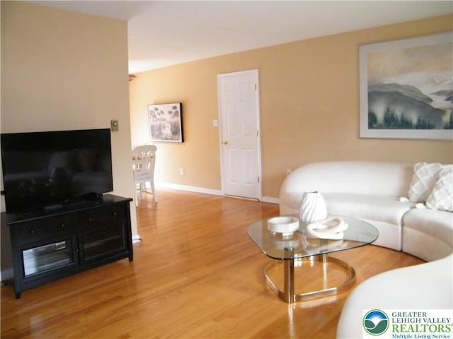 3415 Kathleen Ave, Salisbury Twp, PA 18103 - living room featuring light wood-style flooring and baseboards